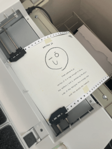 Embossing smiley jó pamphlet using embosser